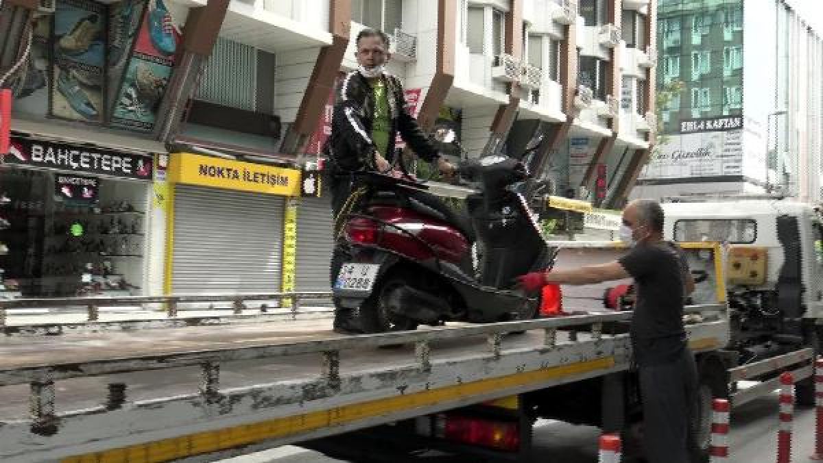 Sokağa çıkma kısıtlamasında motosiklet ile tur atarken yakalandı -1